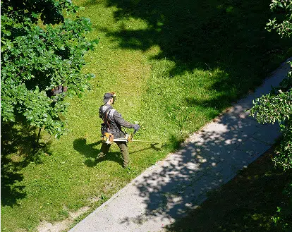 An arial view of someone cutting grass