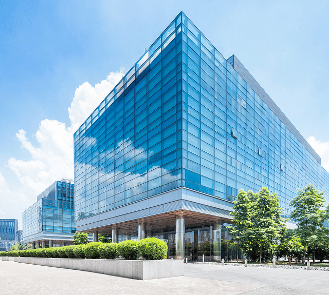 An exterior image of a large modern building