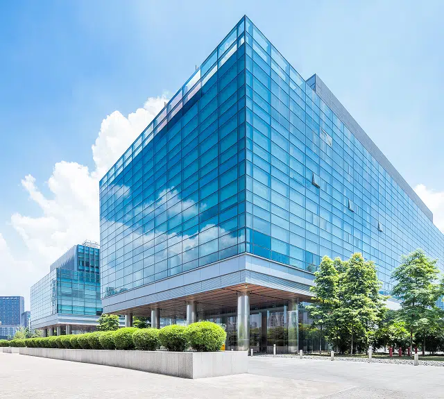 An exterior image of a large modern building