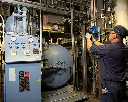 A man working in an engine room